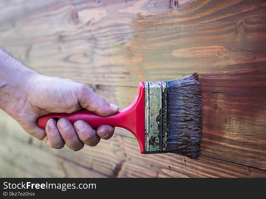 Paintbrush on wood - brush on wooden texture paintbrush on wood - brush on wooden texture