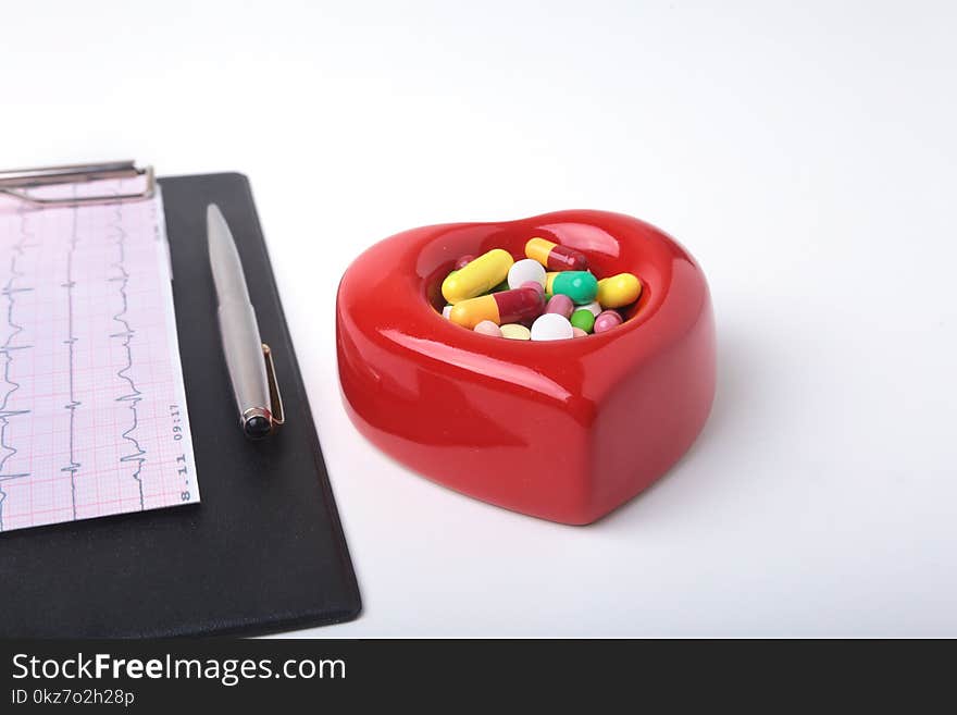 RX Prescription, Red Heart, Asorted Pils And A Stethoscope On White Background