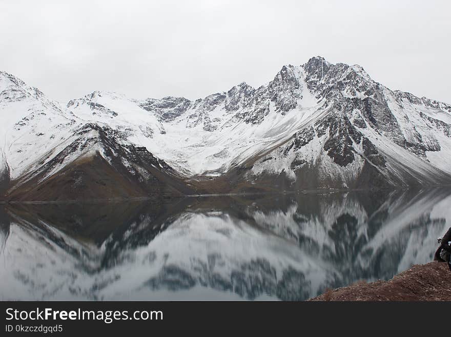 Mountain Covered With Snow Near Lake Landscape Photography