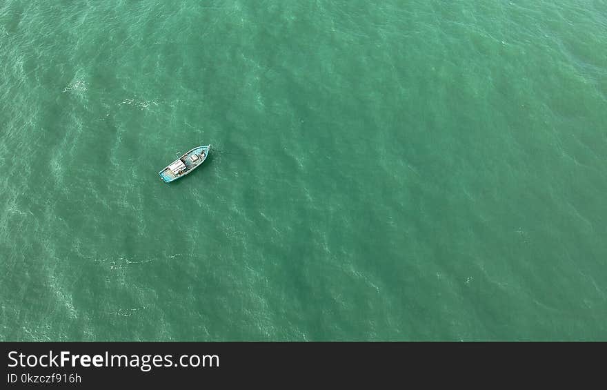 Boat on Calm Body of Water