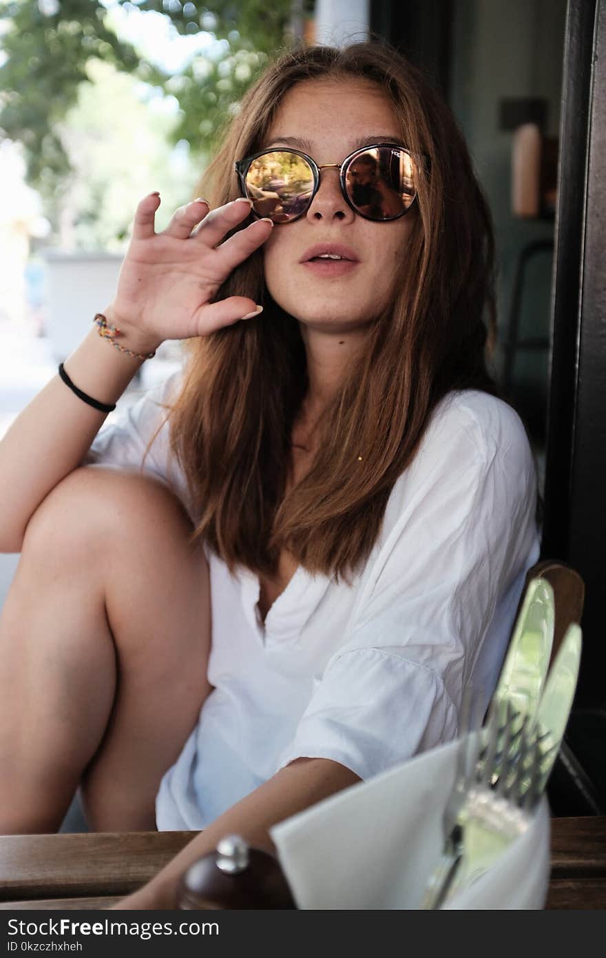 Woman in White Long-sleeved Blouse Wearing Sunglasses