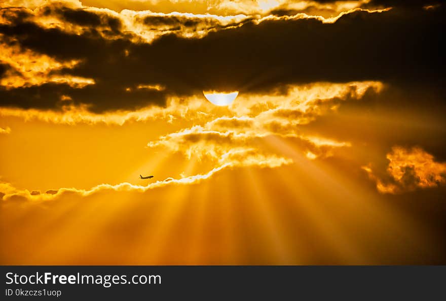 Airplane Flying During Golden Hour