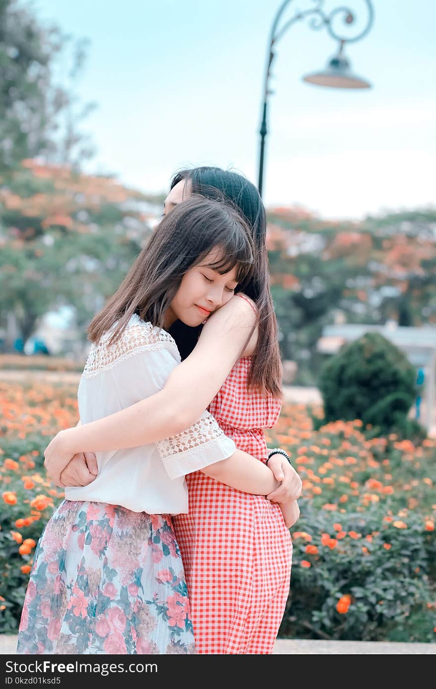 Two Women Hugging Each Other