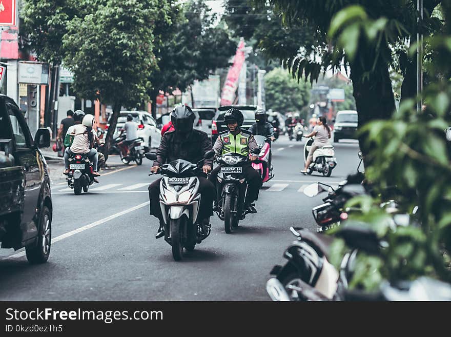 Photography of People Riding Motorcycles