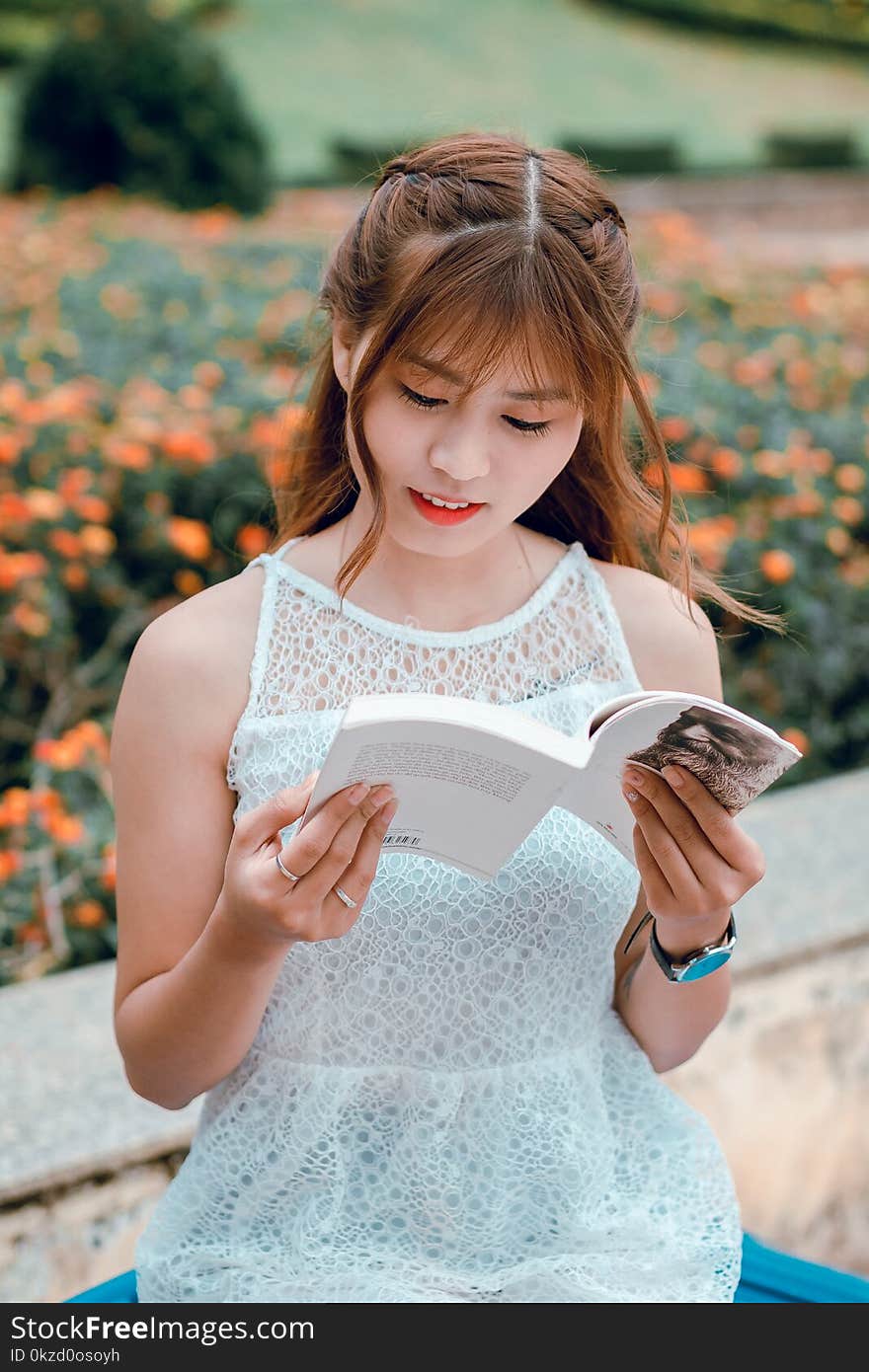 Selective Focus Photography Of Woman Reading A Book