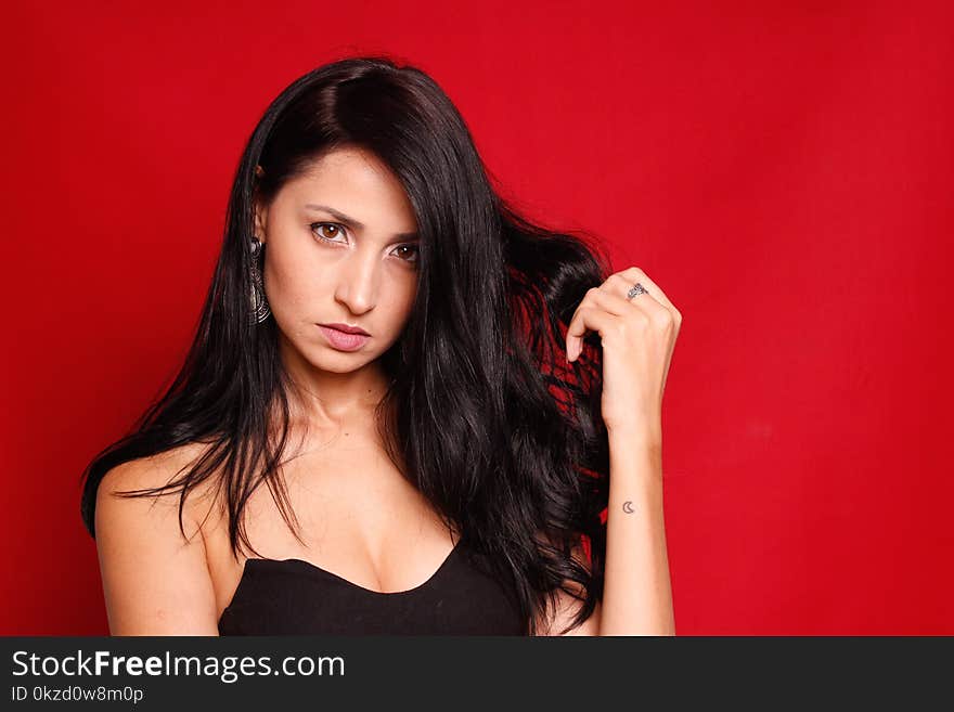 Woman Wearing Black Strapless Top