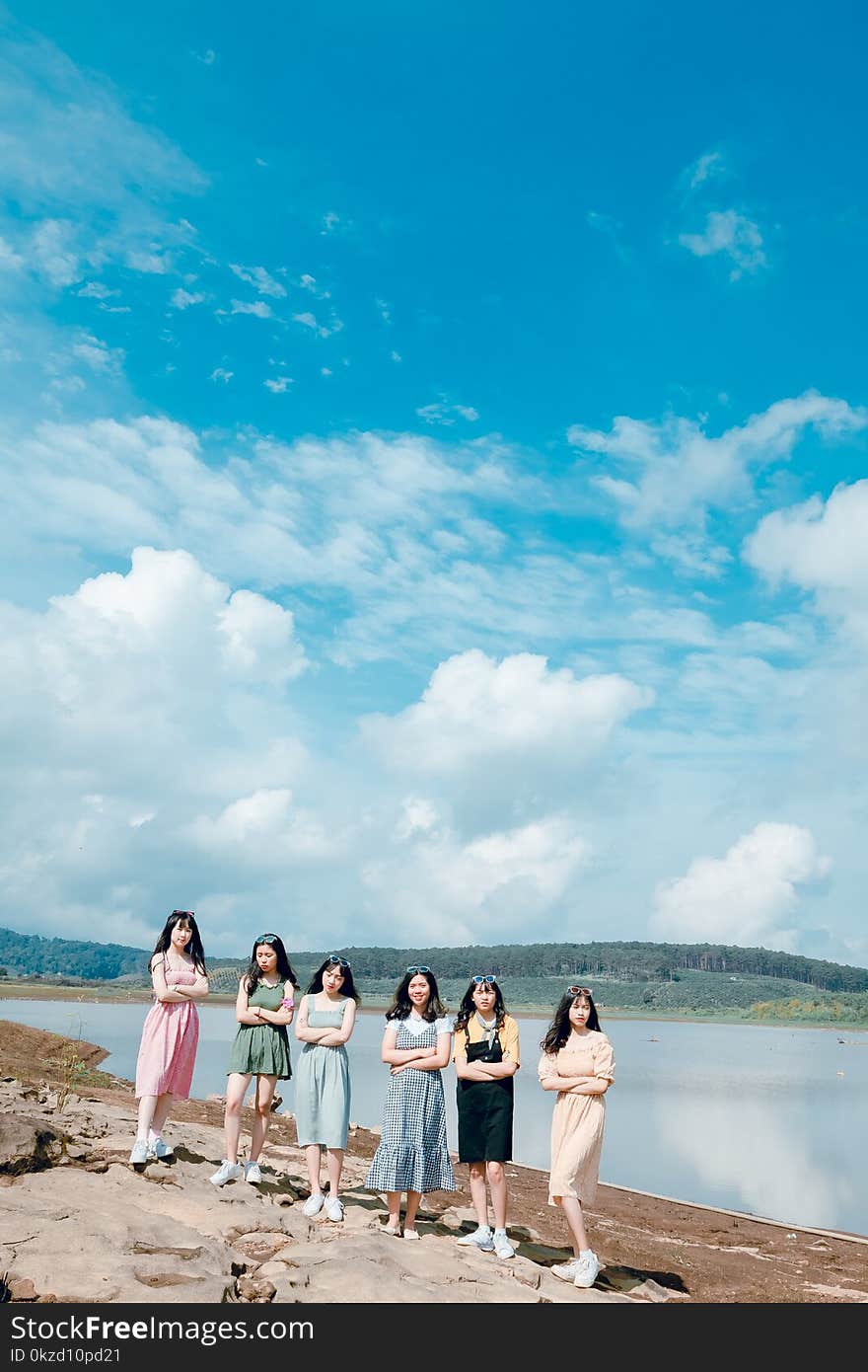 Six Women Near Body of Water