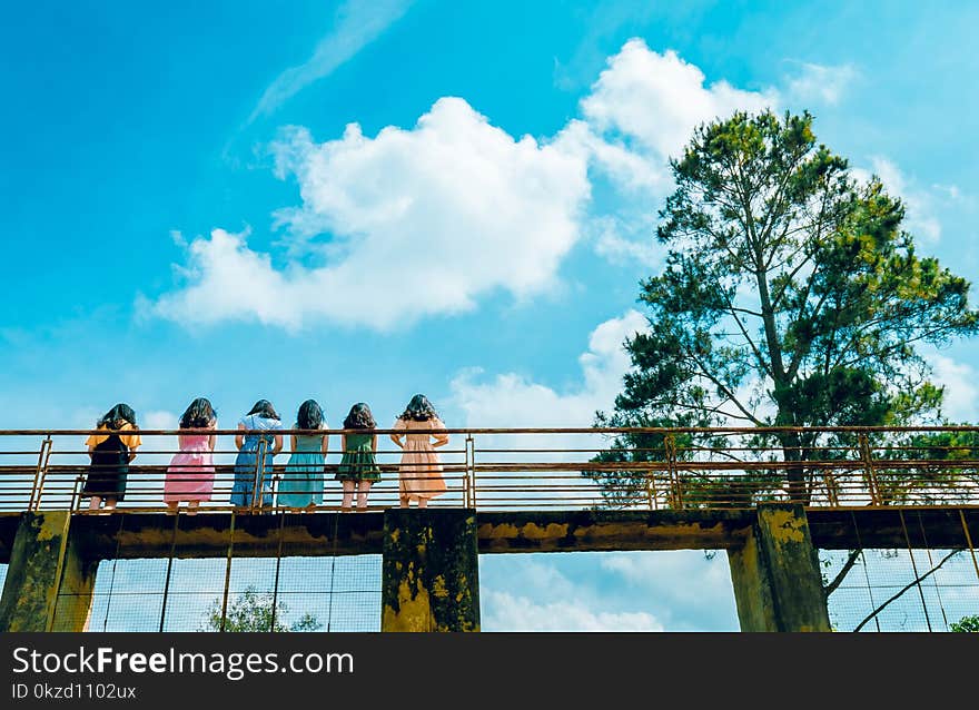 Six Girl Standing on Suspension Bridge