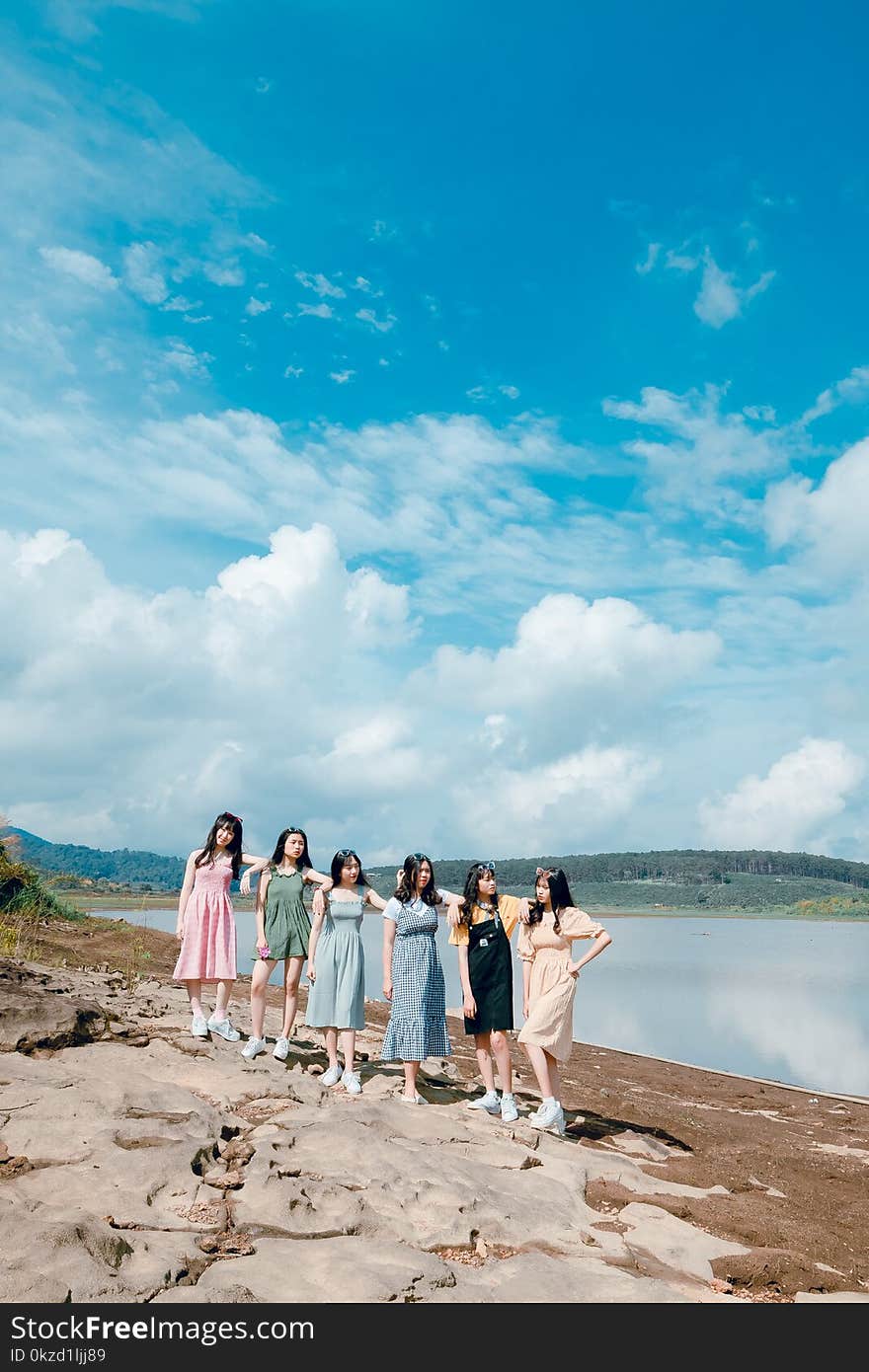 Photo of Six Women on Brown Soil