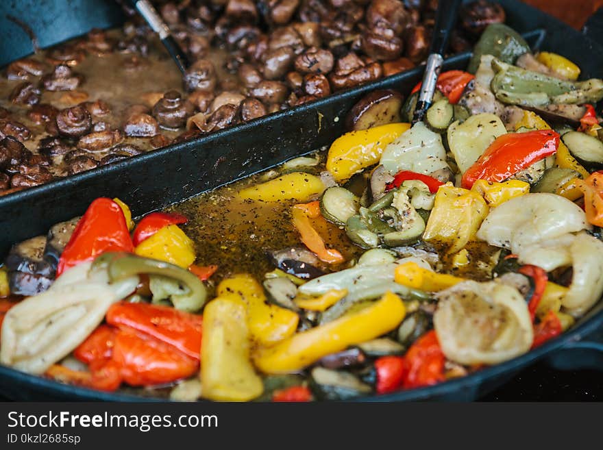 Preparation Of Vegetable Dish From Mushrooms And Vegetables In A Frying Pan