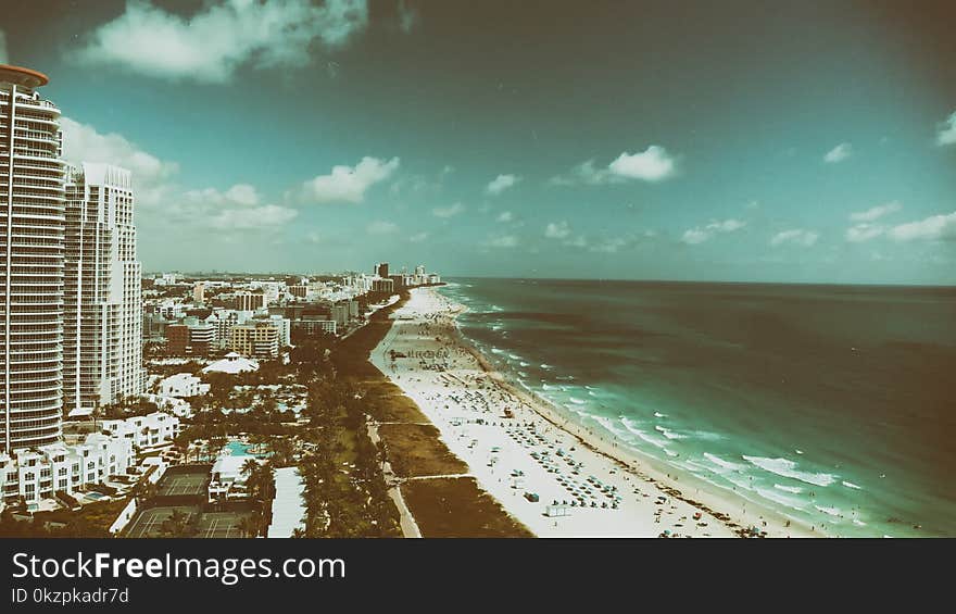 Amazing aerial view of Miami Beach and coastline at sunset, Florida.