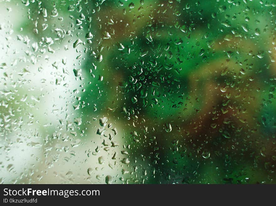 Close-Up Photography of Droplets on Glass