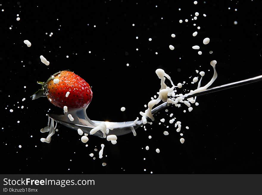 Close-Up Photography of Strawberry on Spoon