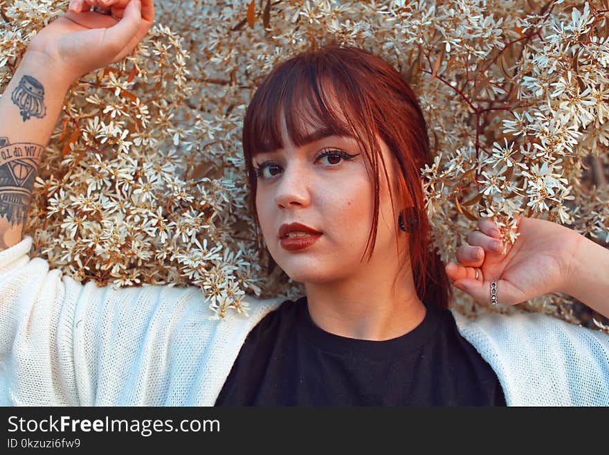 Shallow Focus Photography of Woman in Black Shirt