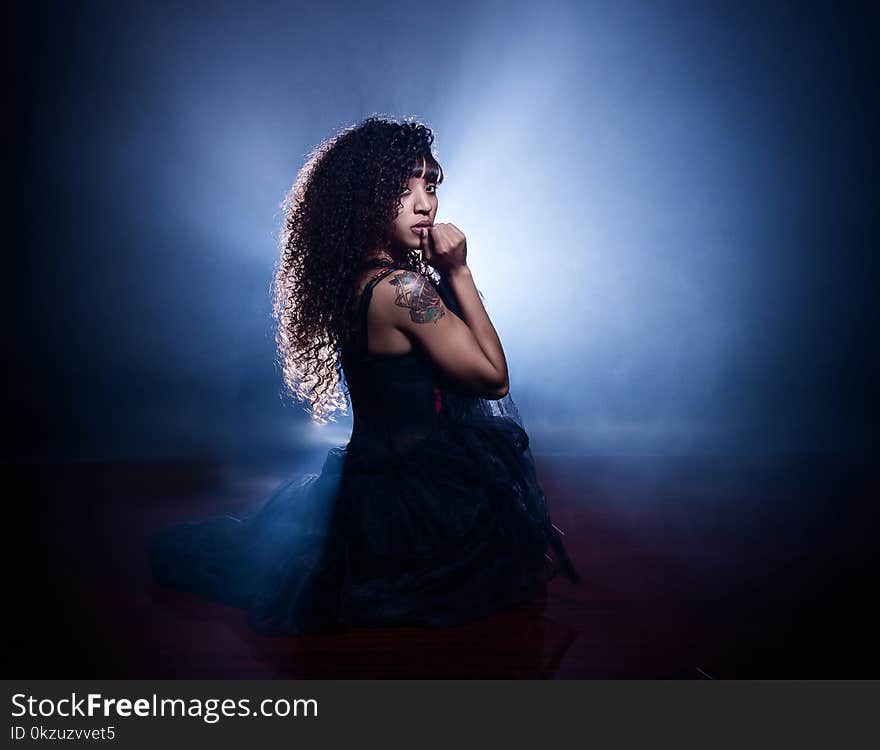 Photography of a Woman Wearing Black Dress