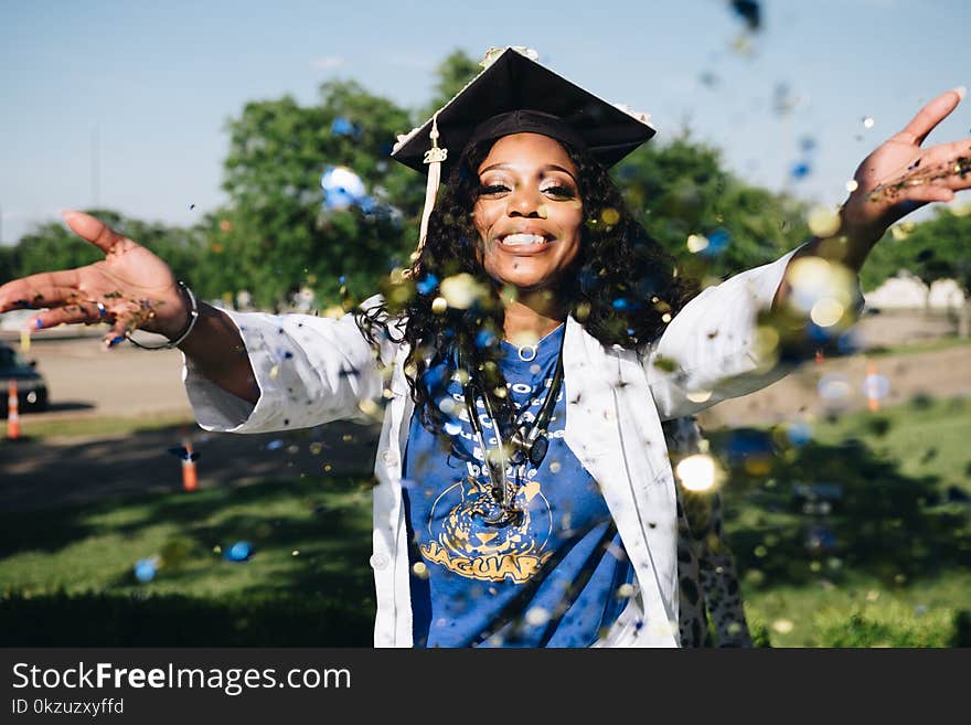 Woman Throwing Confetti