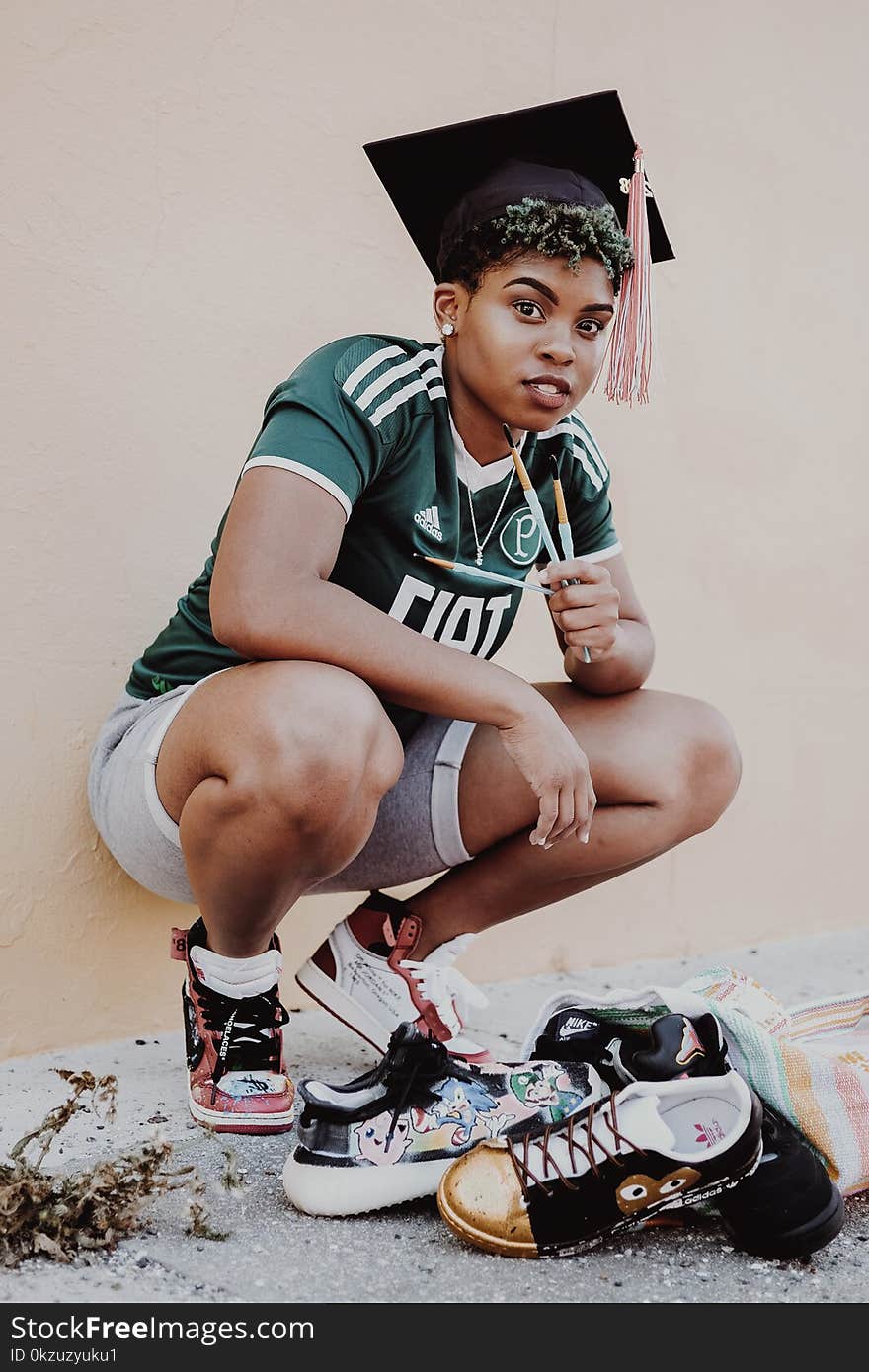 Woman Wearing Green And White Shirt