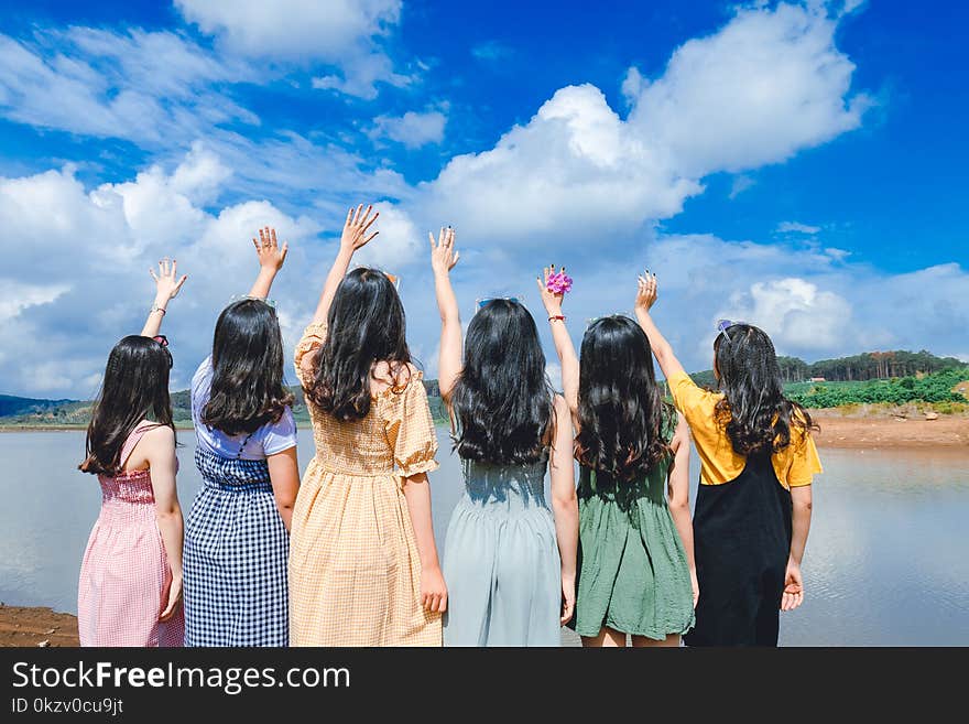 Women Standing Near River