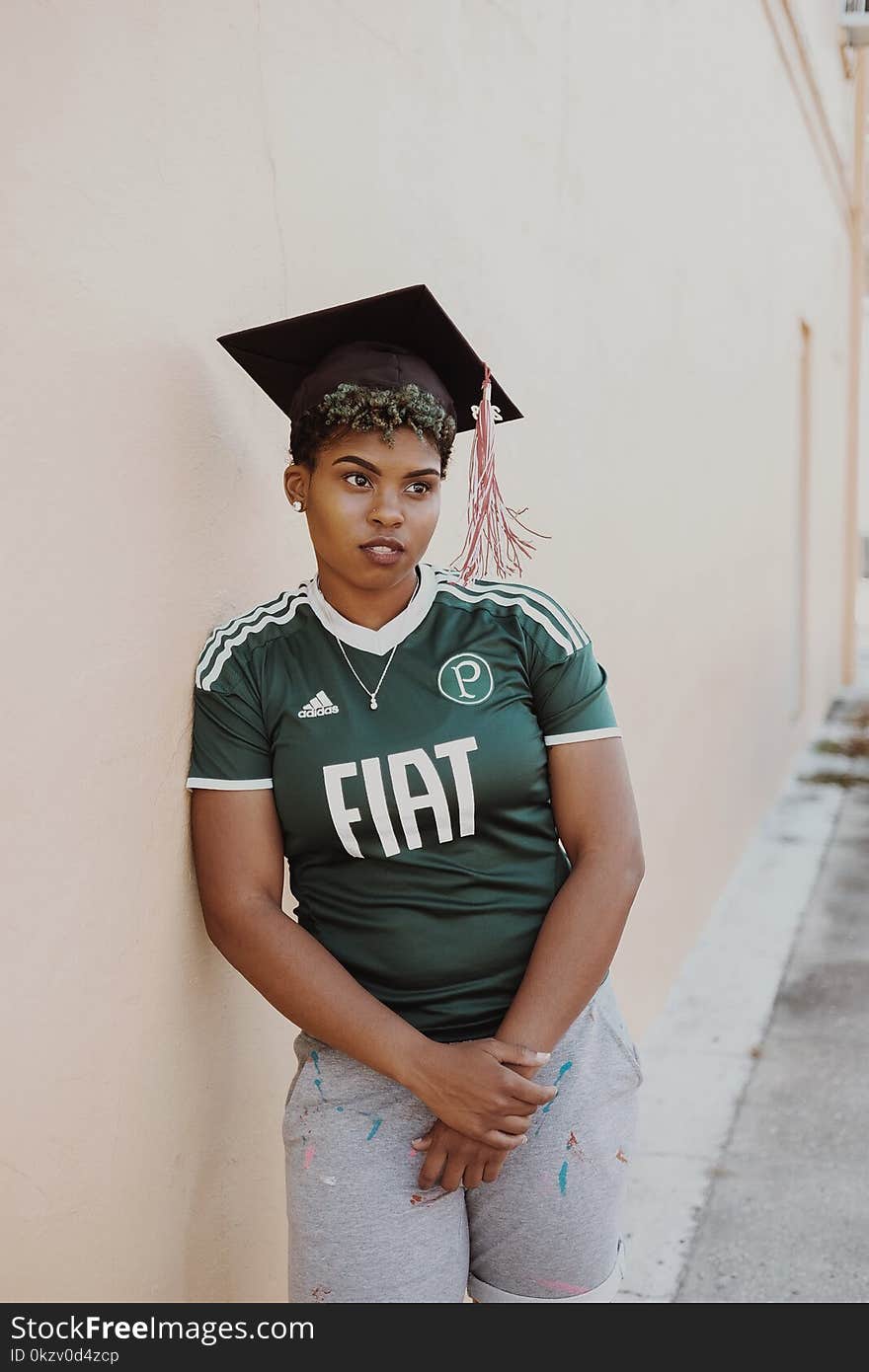 Woman Wearing Green Adidas Jersey