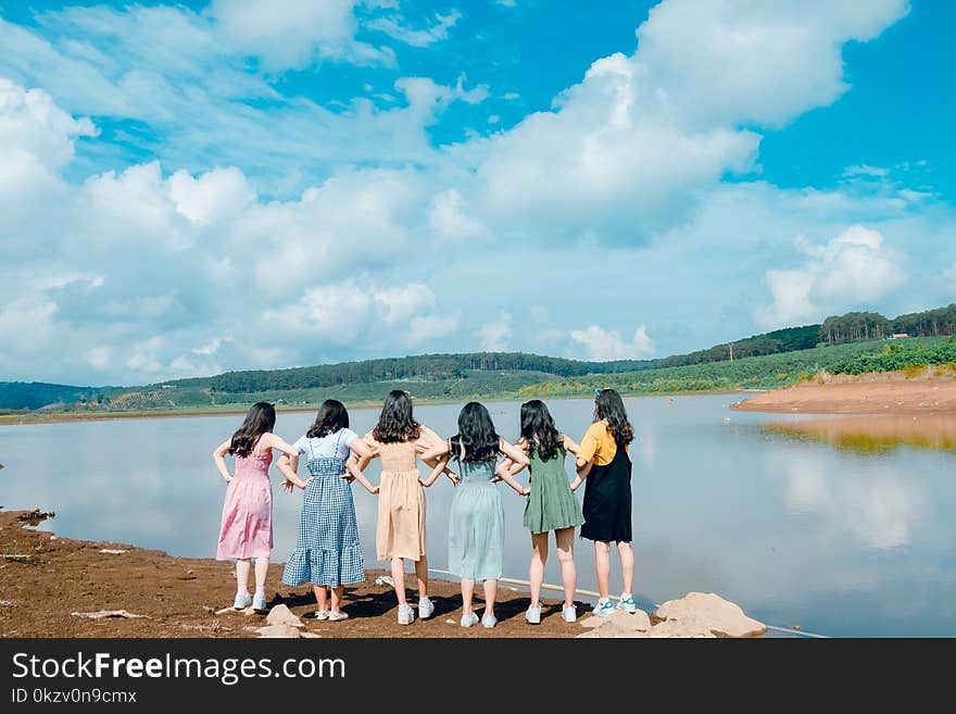 Six Girl&#x27;s Standing in Front of Lake