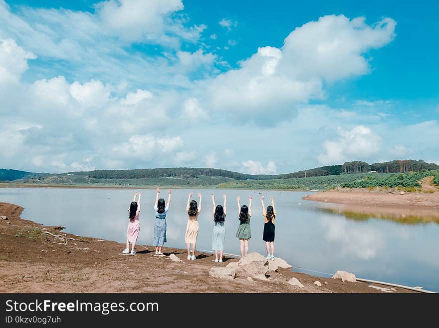 Six Women Raising Their Both Hands