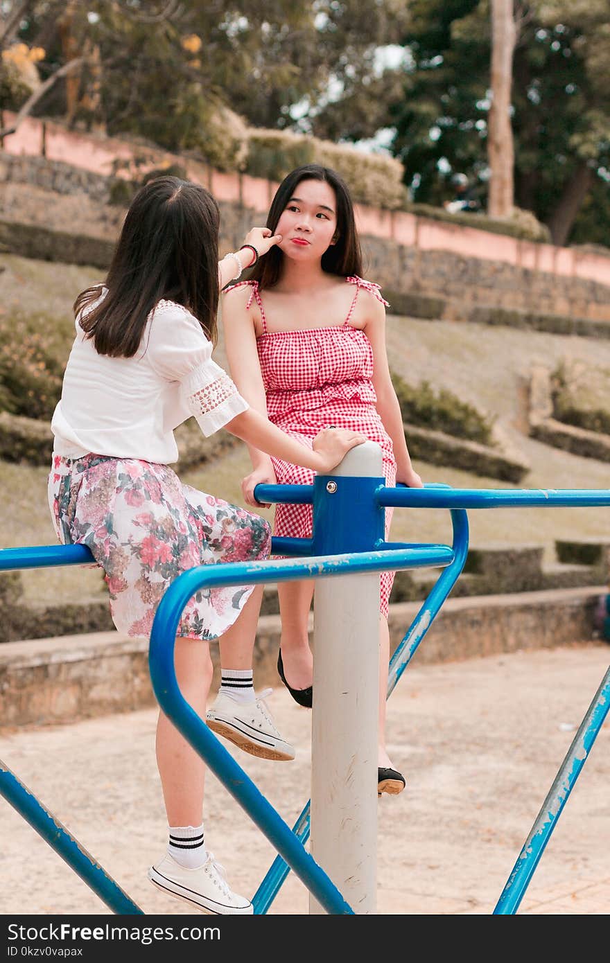 Two Woman on Mary Go Round