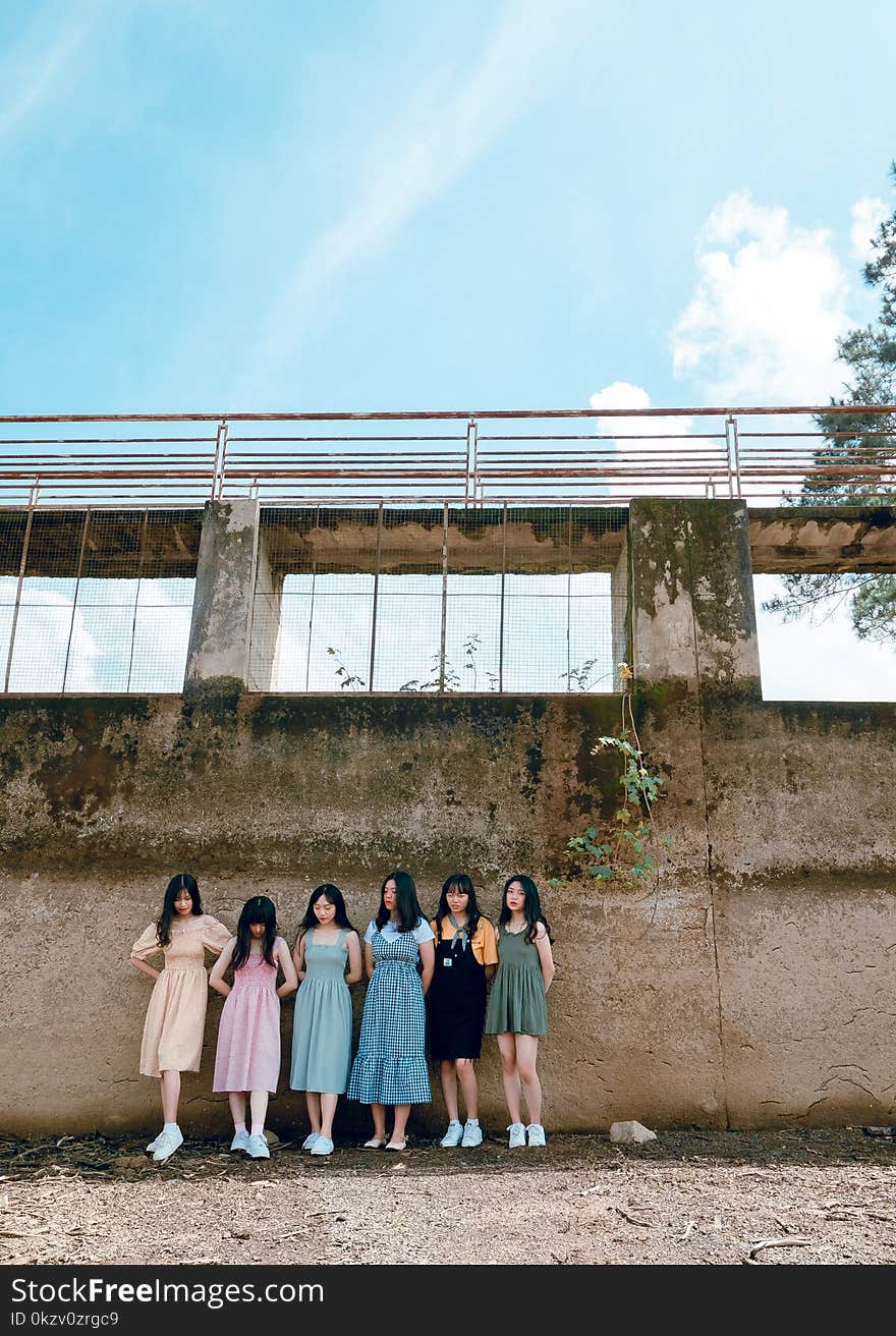 Six Girls on Leaning on Walls