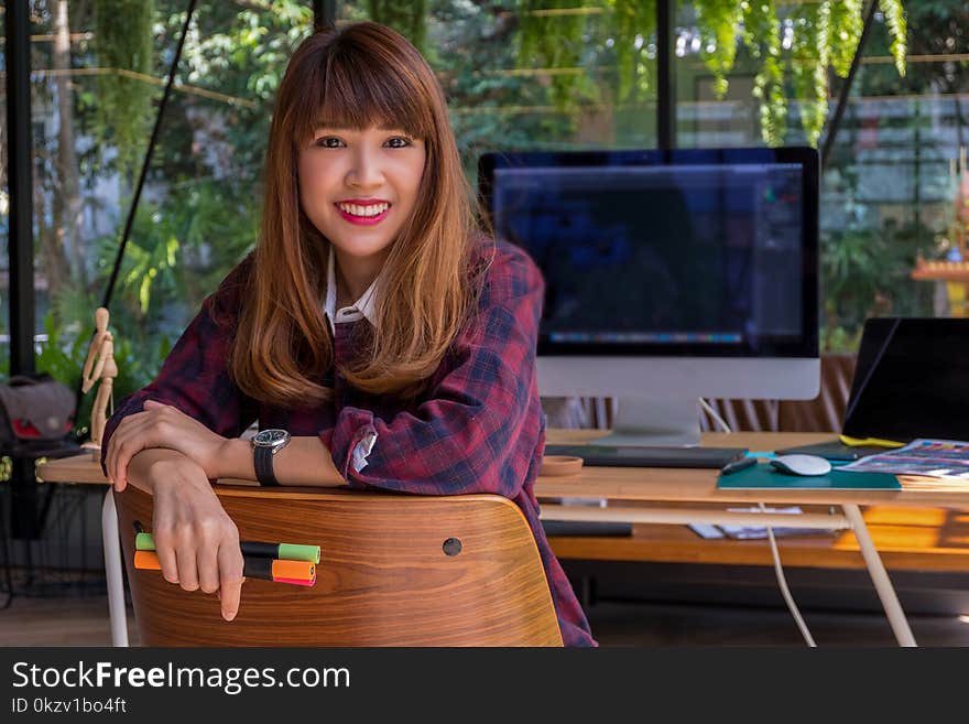 Woman in Red and Black Plaid Dress Shirt