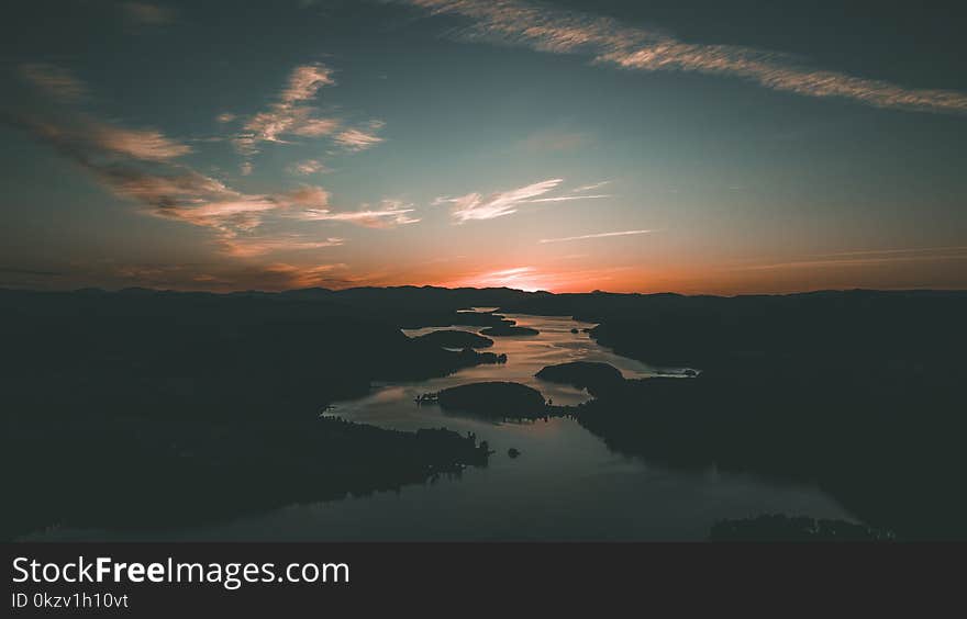 Silhouette of Body of Water