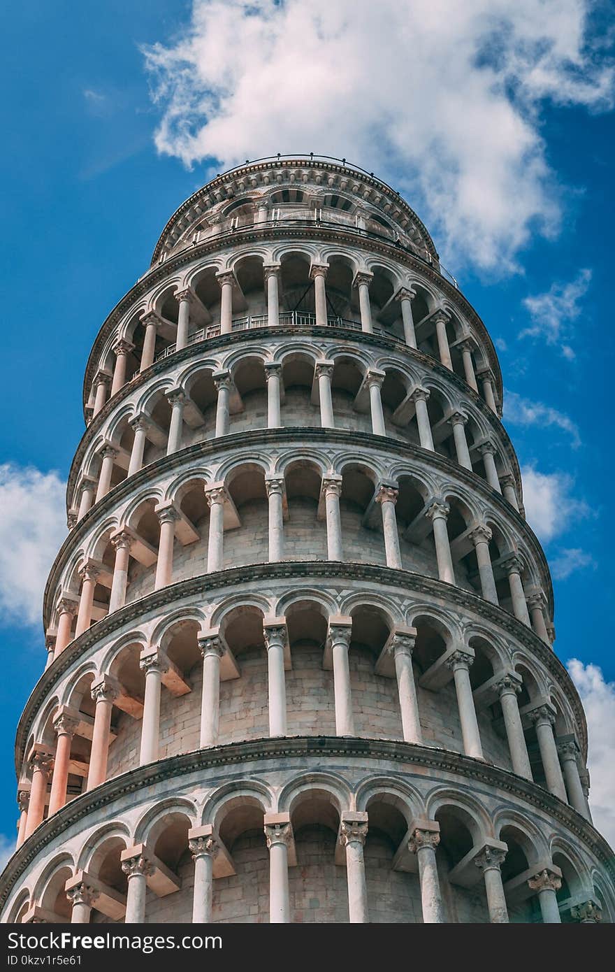 Gray Concrete Tower Under Blue Sky