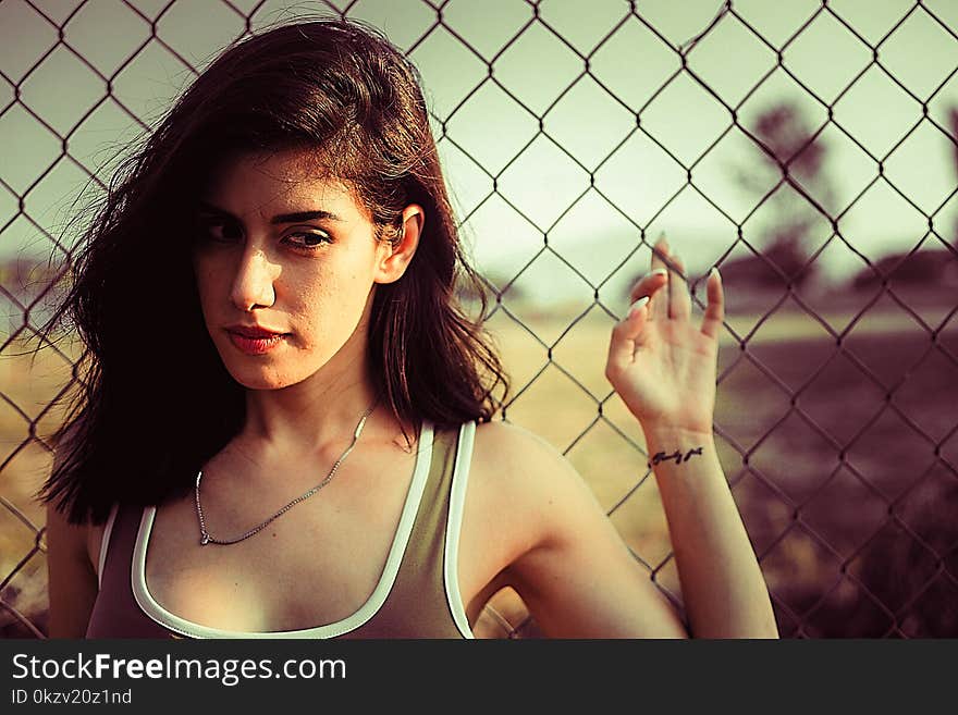 Shallow Focus Photography of Woman in Gray Tank Top