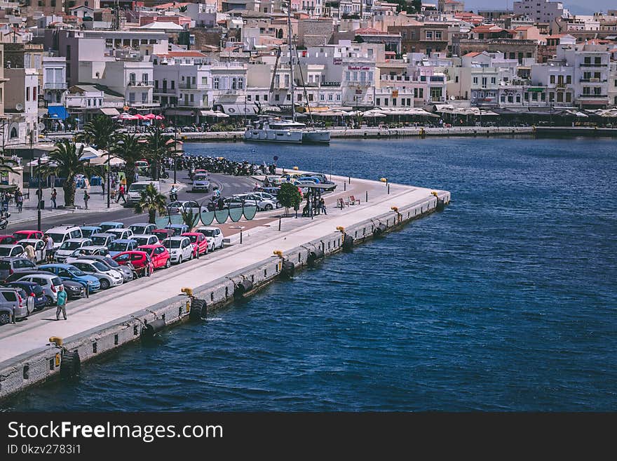 Cars Parked Near Body of Water