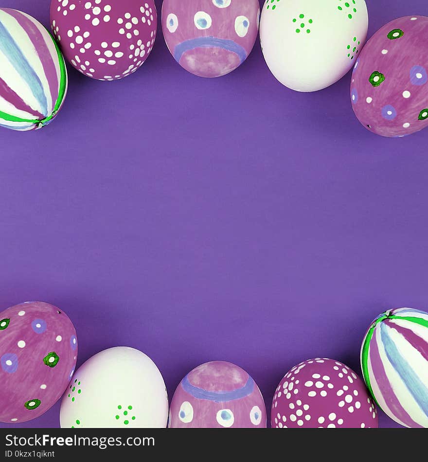 Painted Easter Eggs On Purple Background