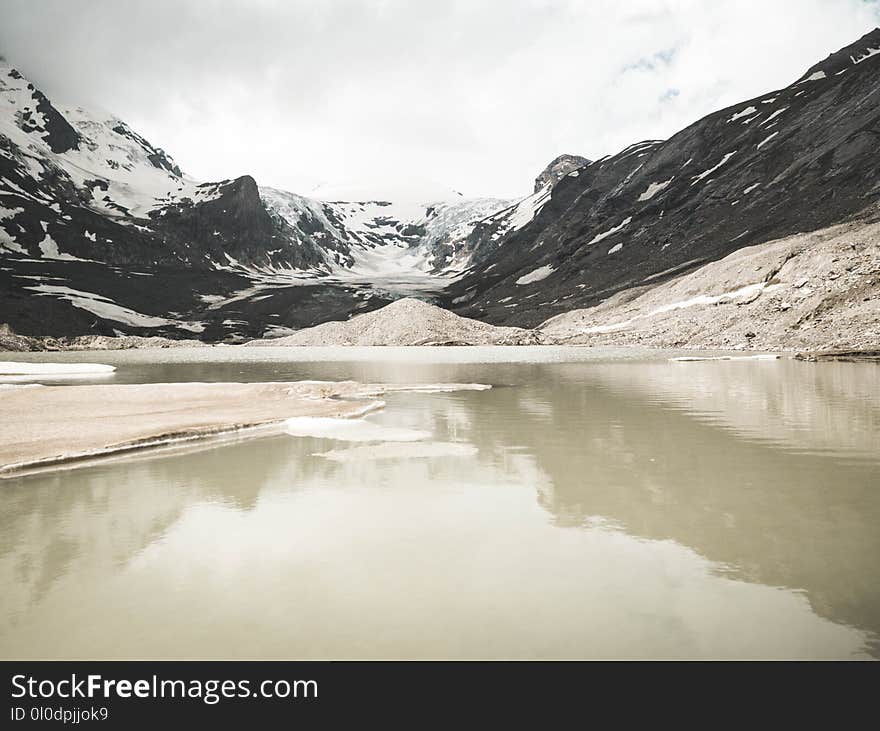 Body of Water Near Mountain