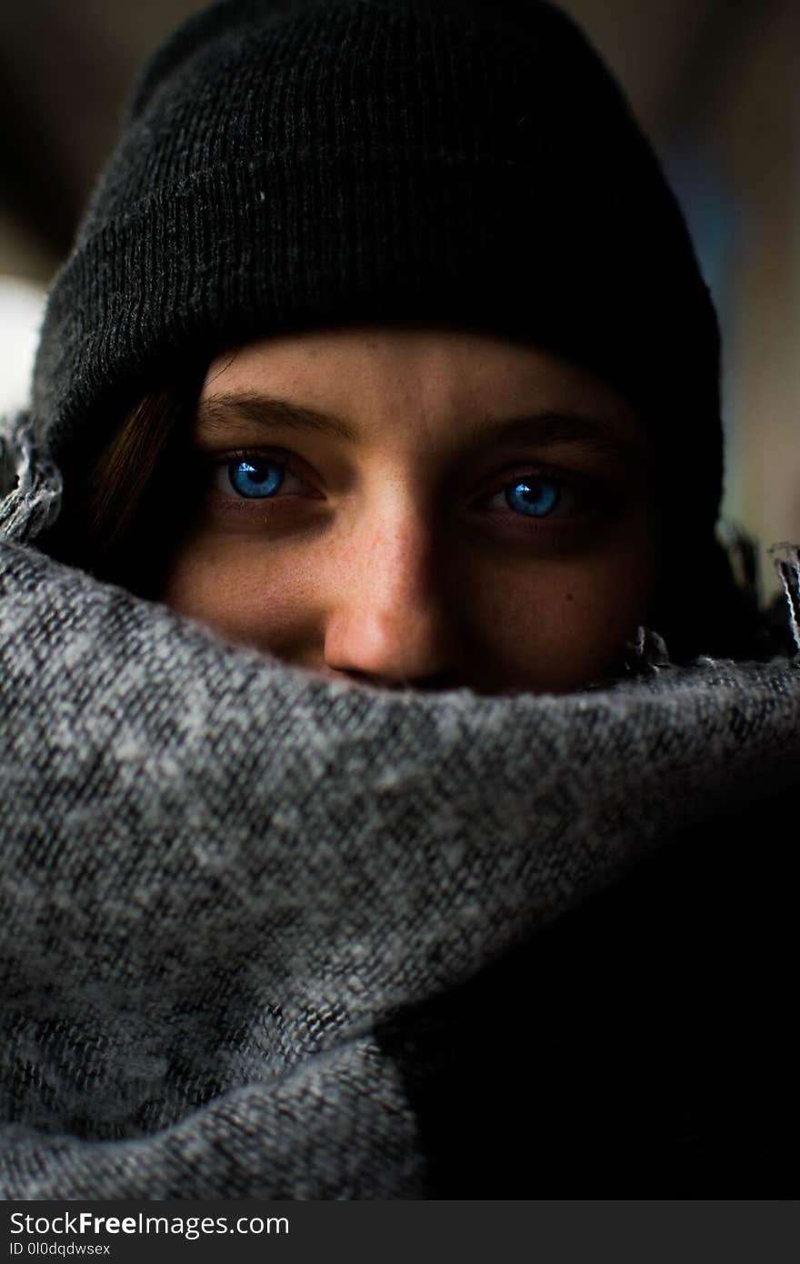 Woman Wearing Black Hat With Blue Eyes