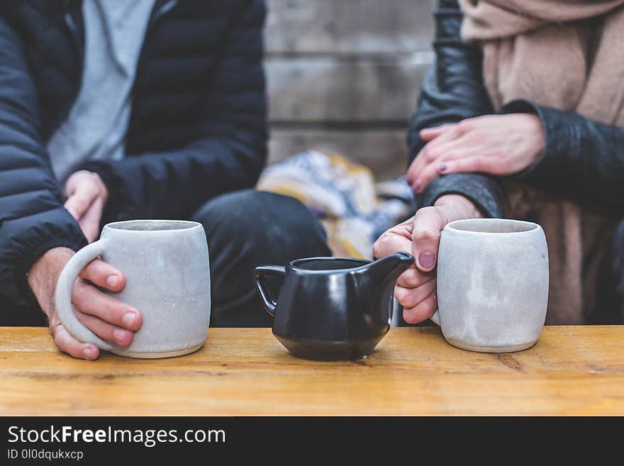 Man and Woman Having a Tea Conversation