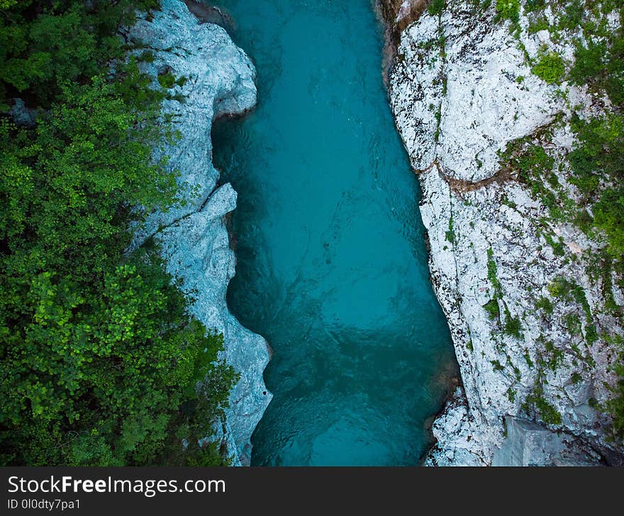 Rocks anf forest along Soca river, drone top down photo,Slovenia
