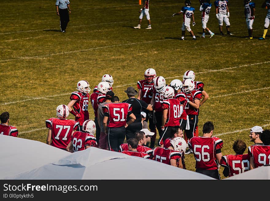 Football Team Wearing Red Jersey