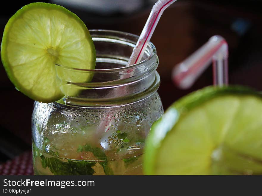 Close-up Photo of Clear Glass Mason Mug With White Liquid