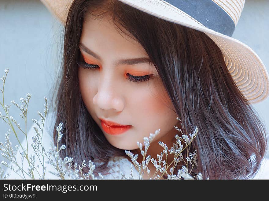 Woman Wearing Brown Sun Hat