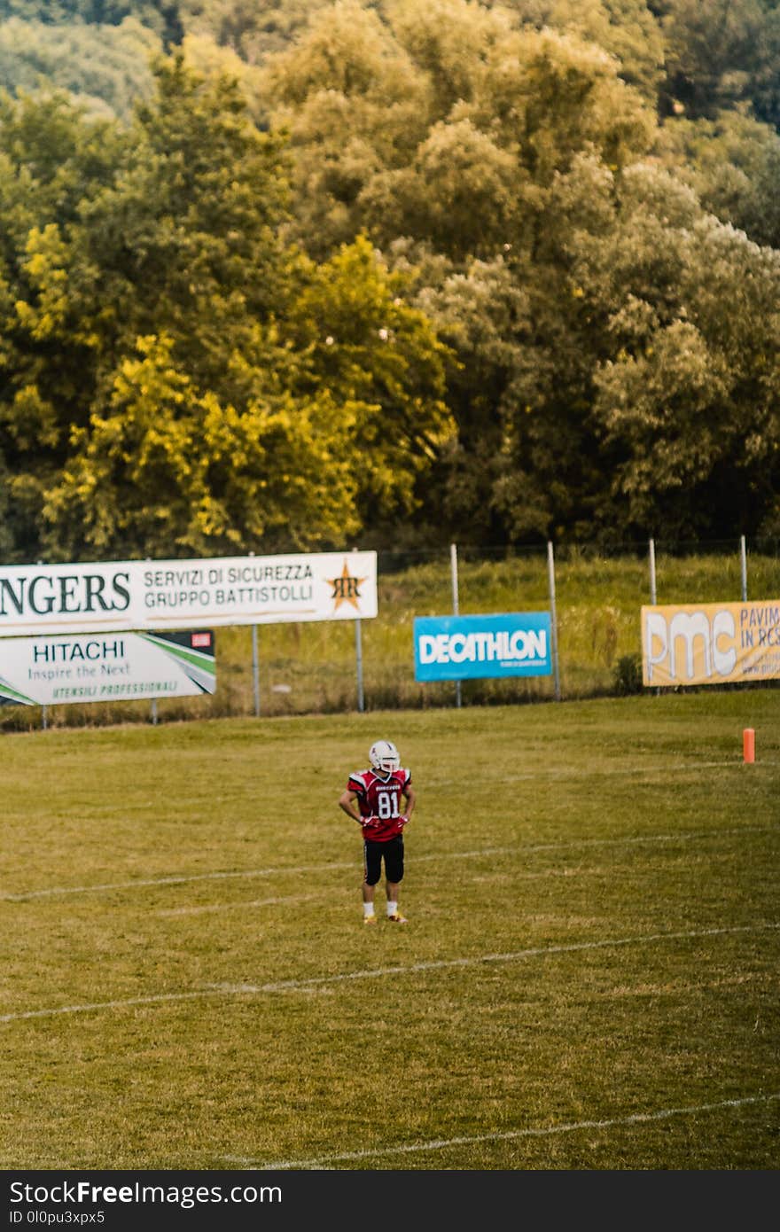 Person Wearing White Football Helmet