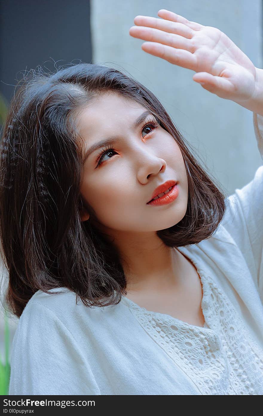 Shallow Focus Photography of Woman in White Top