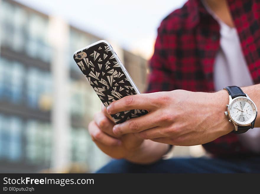 Person Holding Iphone