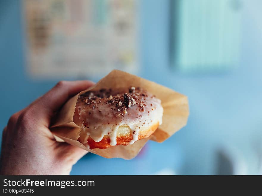 Person Holding Doughnut