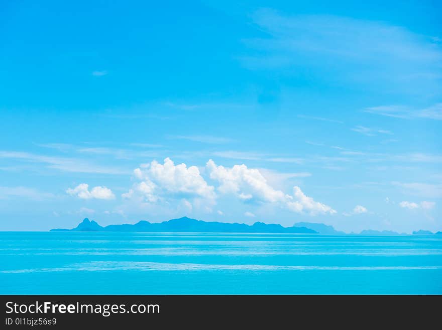 Beautiful Sea And Ocean With Cloud On Blue Sky