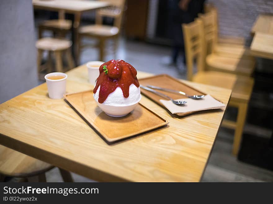 Bingsu strawberry close up on the wooden table. Bingsu strawberry close up on the wooden table