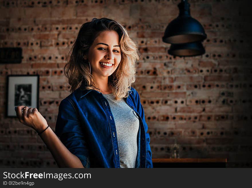 Woman Wearing Blue Button-up Jacket