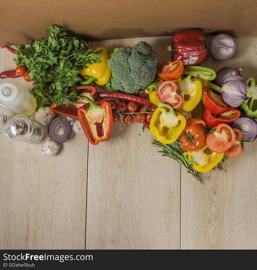 Wooden Background With Organic Vegetables On The Side, Top View