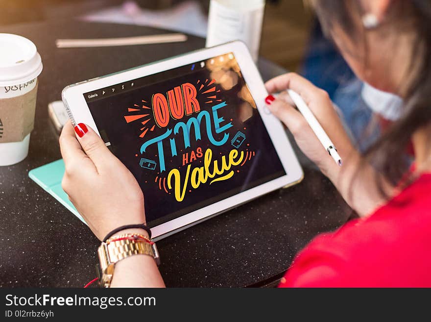 Woman Holding Silver Ipad