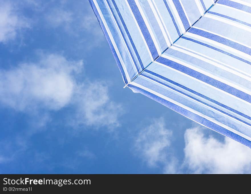 Photo of White and Black Umbrella